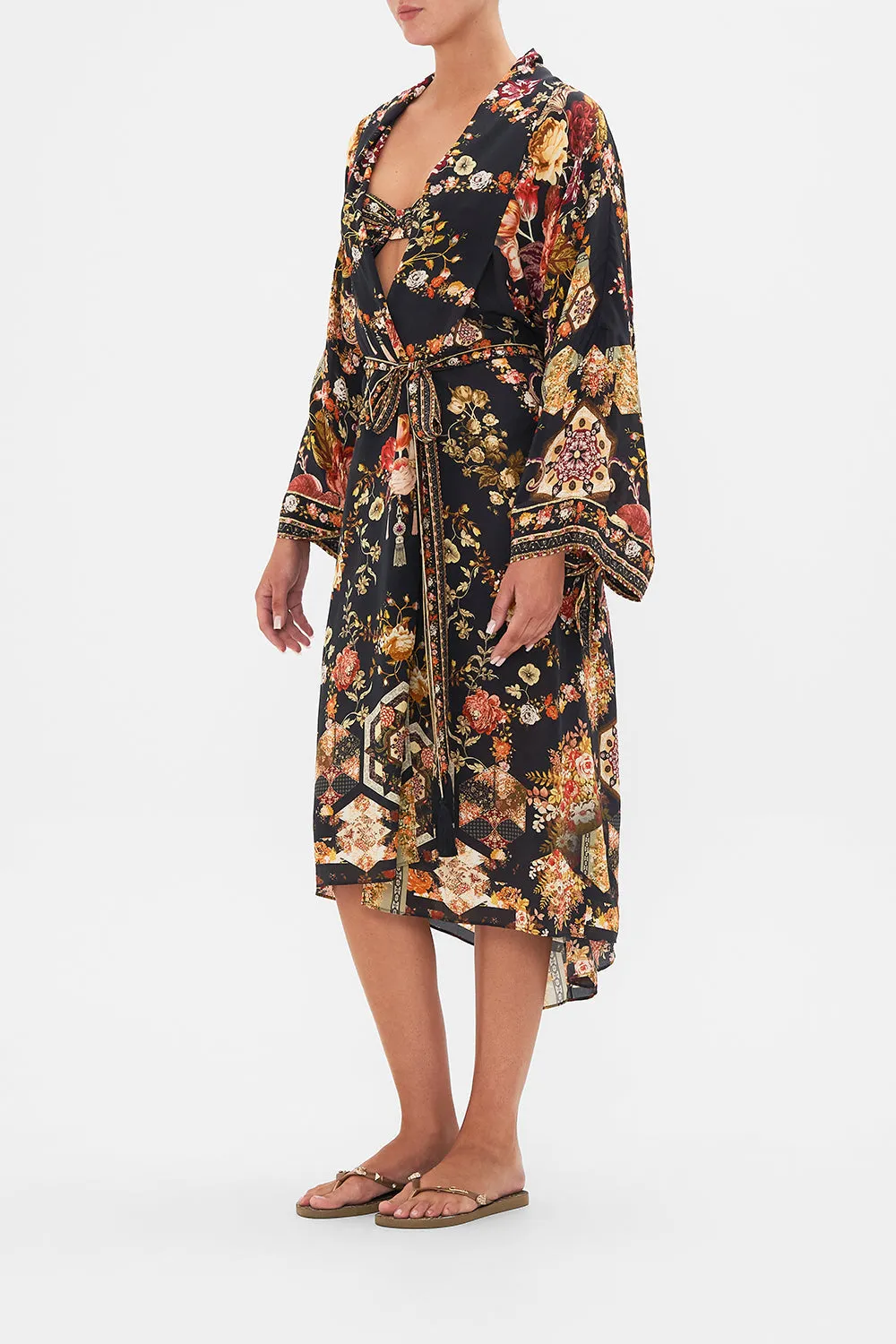OVERSIZED LAYER WITH TIE SLEEVE STITCHED IN TIME