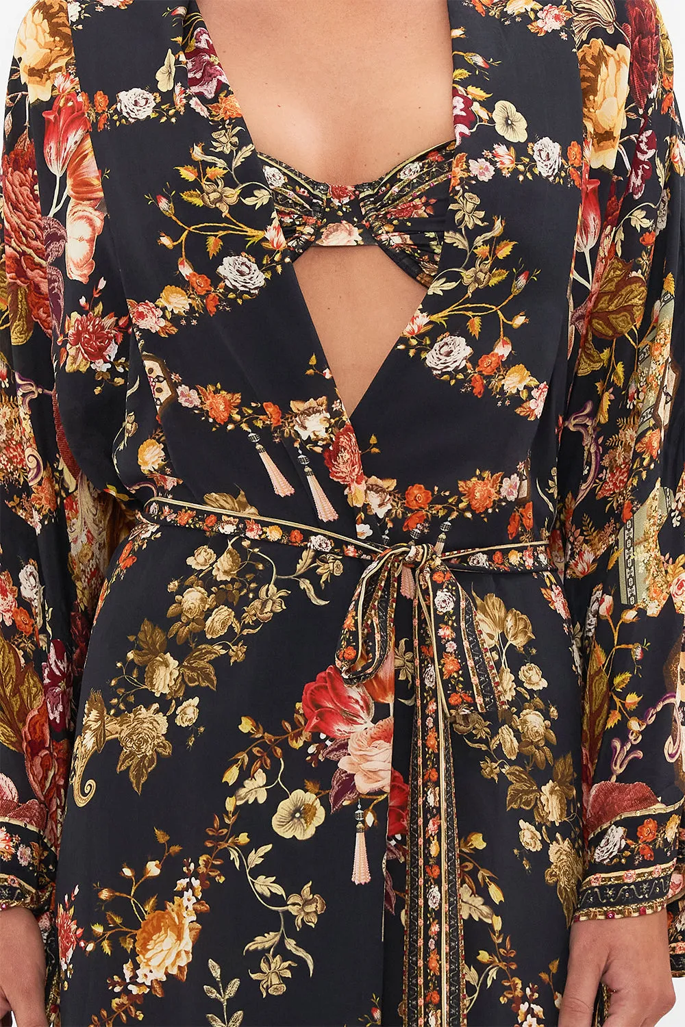 OVERSIZED LAYER WITH TIE SLEEVE STITCHED IN TIME